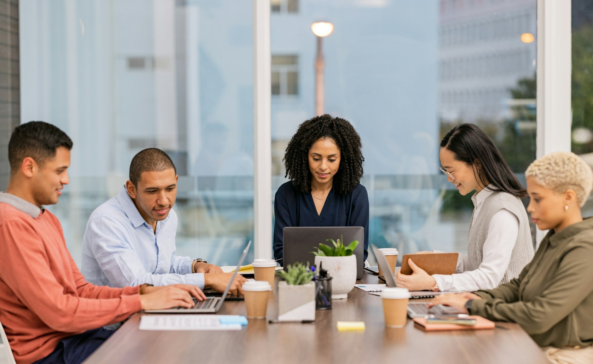 Content marketing SEO, laptop or business people in meeting planning a group or startup project. Te